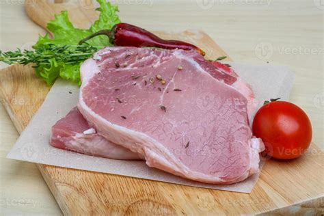 Raw pork steak 8495379 Stock Photo at Vecteezy