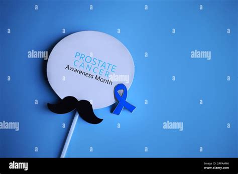 Mustache And Blue Ribbon With Text Prostate Cancer Awareness Month