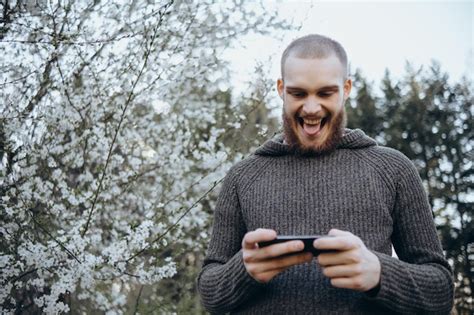 Premium Photo Young Bearded Man Showing Sincere Excitement About His