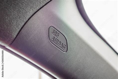 Safety side curtain airbag sign in new modern car Stock Photo | Adobe Stock