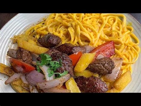 LOMO SALTADO AHUMADO CON TALLARINES A LA HUANCAINA YouTube