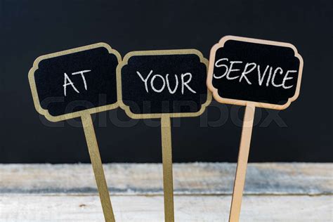 Concept Message At Your Service Written With Chalk Stock Image