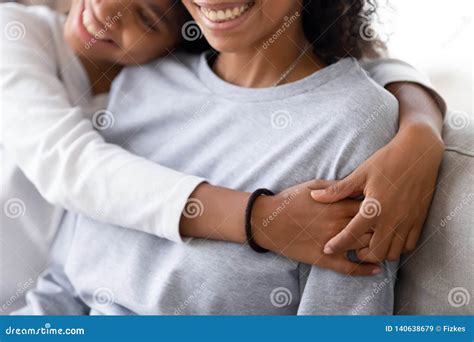 Cropped Image Of African Daughter Embracing Mother Stock Image Image