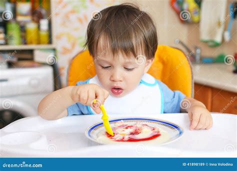 Baby Eating Semolina Porridge With Jam Stock Image Image Of Appetite