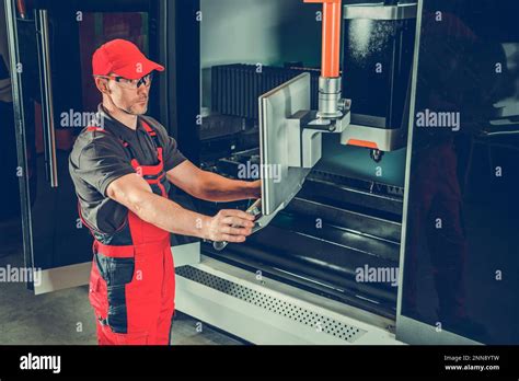 Professional Industrial Laser Cutting Machine Operator At His Workplace