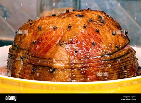 Glazed Cooked Baked Hickory Smoked Spiral Cut Honey Ham Stock Photo - Alamy