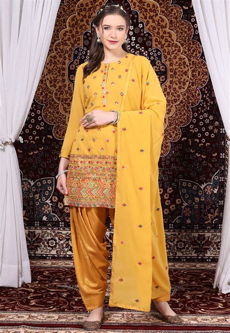 Embroidered Georgette Punjabi Suit In Mustard KCH10790