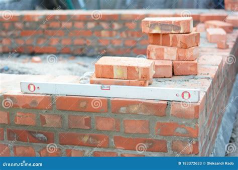 Building A Brick Foundation Wall Corner Of A House Construction Using