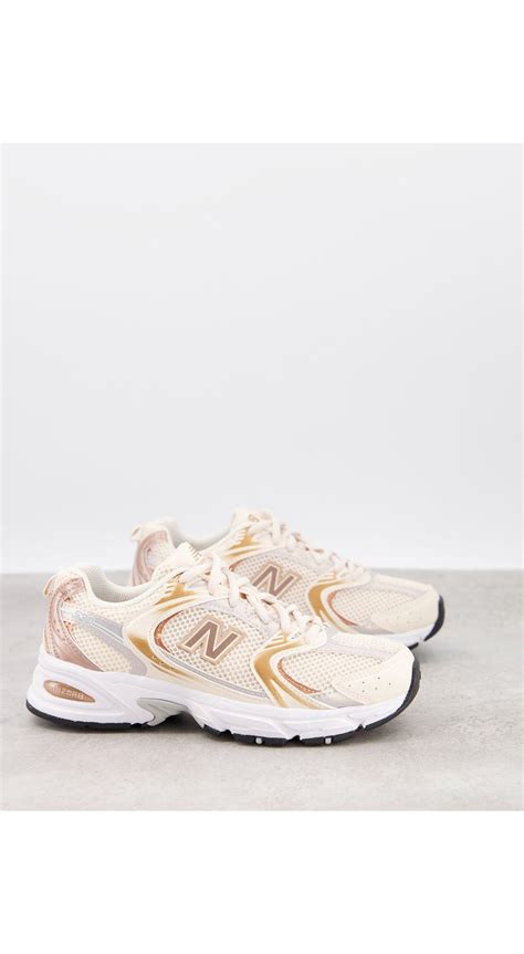 New Balance Metallic Trainers In Pink Lyst Canada Lupon Gov Ph