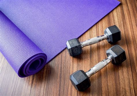 Dumbells and Yoga Mat in Workout Gym. Stock Image - Image of space, working: 111544069