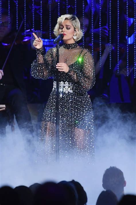 Lady In Black Dress On Stage With Microphone