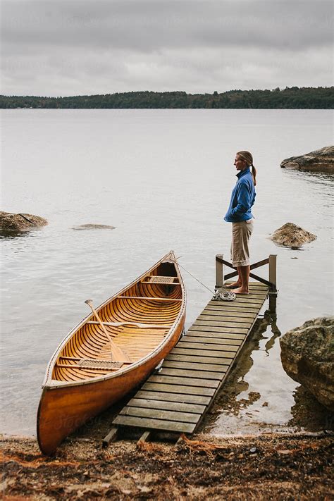 Woman With Canoe By Stocksy Contributor Raymond Forbes LLC Stocksy