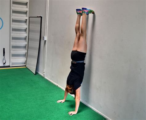 How To Do A Handstand Redefining Strength