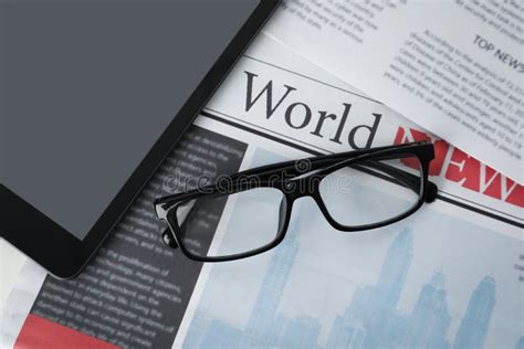 Glasses And Tablet On Newspapers Flat Lay Stock Image Image Of