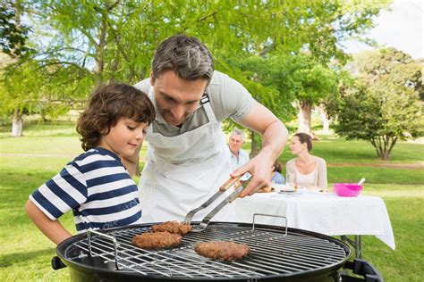 Family on vacation having barbecue — Stock Photo © Wavebreakmedia #39202679