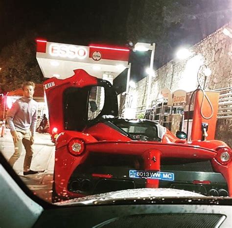 Nico Rosberg Checks His Ferrari Laferraris Tire Pressure In Monaco