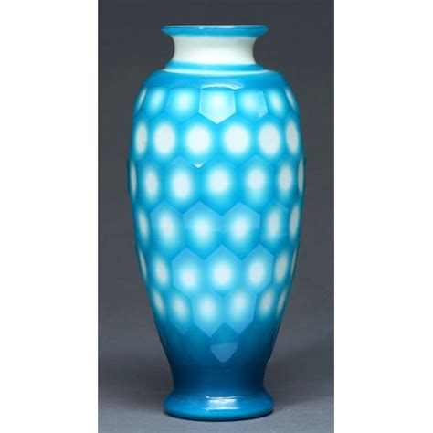 A Chinese Glass Vase 20th C The Creamy Opal Glass Cased In Blue And Cut With Hexagons 28 5cm H