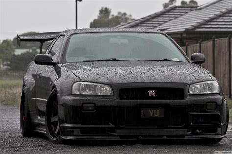 Black Nissan Skyline R 34 Gtr Under The Rain 4k Wallpaper Download