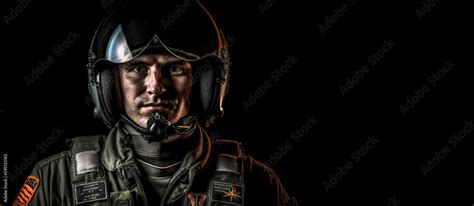 Portrait of fighter pilot wearing helmet on dark background with copy ...