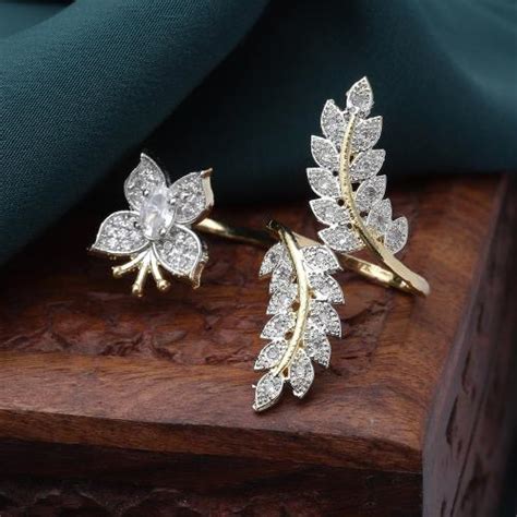 Buy Zeneme Gold Plated White American Diamond Studded Butterfly Leaf