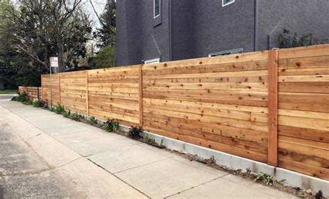 15 Fence On A Slope Ideas For Your Backyard Ergeon