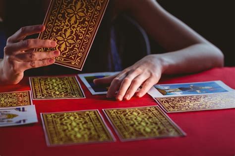 Premium Photo | Fortune teller using tarot cards