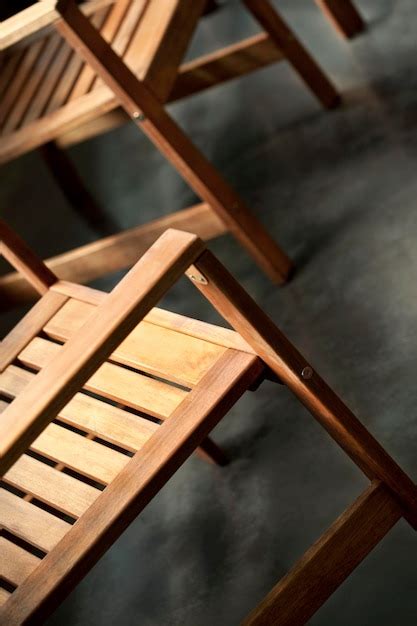 Premium Photo Close Up Of Wooden Chairs