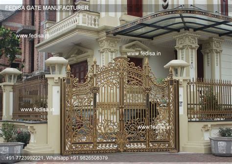 An Ornate Iron Gate In Front Of A House