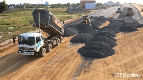 The Best Team Work Use His Skills Installing New Road By Bulldozer