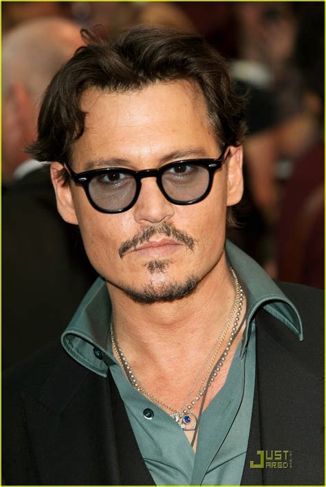 Johnny Depp Uk Pirates Premiere With Penelope Cruz Photo