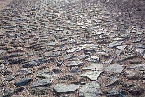 Texture Background The Pavement Of Granite Stone Old Cobblestone