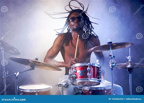 Expressive Artictic Black Man Playing Drums Isolated Over White Smoky