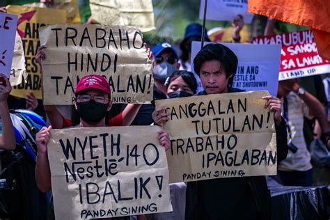 faith based group decries layoff  nestle wyeth workers catholic