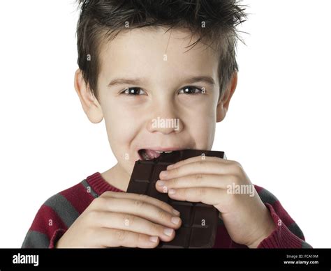 Smiling Kid Eating Chocolate Stock Photo Alamy