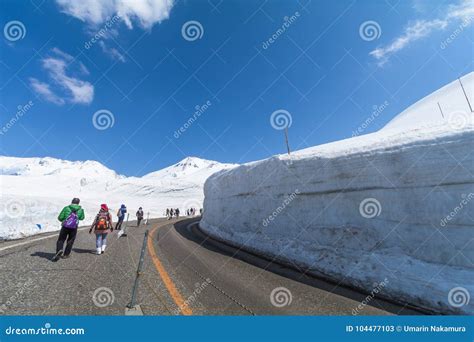 Road between Snow Wall of Tateyama Kurobe Alpine Route or Japa ...