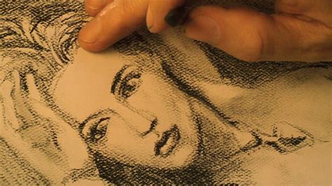 A Drawing Of A Woman S Face Is Being Drawn