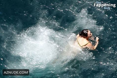 Charli XCX Sizzles In The Italian Sun In Her Sexy Skimpy Green Bikini AZNude