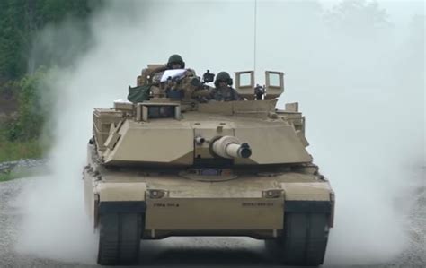 Watch U S M1 Abrams Tanks In Action Firing Impressive Tracer Shells On