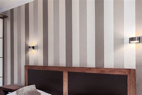 Bedroom Wall With Vertical Stripes In Different Shades Of Gray And