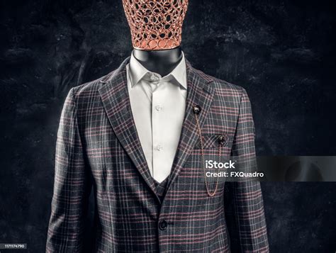 Male Mannequin In Exclusive Custom Made Mens Suit In A Dark Tailor