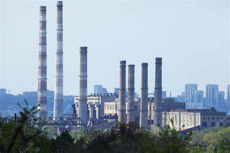 Premium Photo | Factory in the industrial city skyline with plant