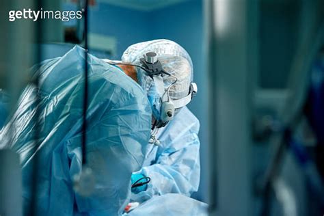 Portrait Of Team Of Multiethnic Surgeons At Work In A Operation Theatre