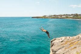 Shipwreck Beach On Kauai, Hawaii: Cliff Jump & Coastal Trail