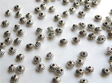 100 Tiny Corrugated Double Cone Bicone Beads By Sparklingsistersjs