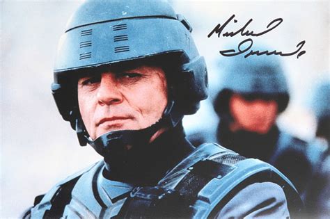 STARSHIP TROOPERS, "Jean Rasczak", MICHAEL IRONSIDE (Canada, born 1950), signed color photograph ...