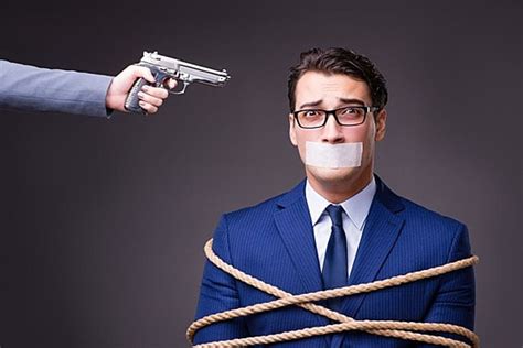 Businessman Taken Hostage And Tied Up With Rope Background And Picture