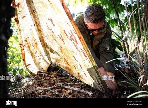 A 20th Fighter Wing Pilot Builds A Shelter During Combat Survival