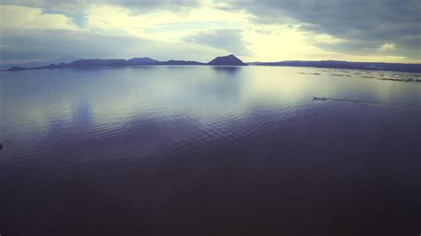 Camera flying over Taal Lake 1290845 Stock Video at Vecteezy