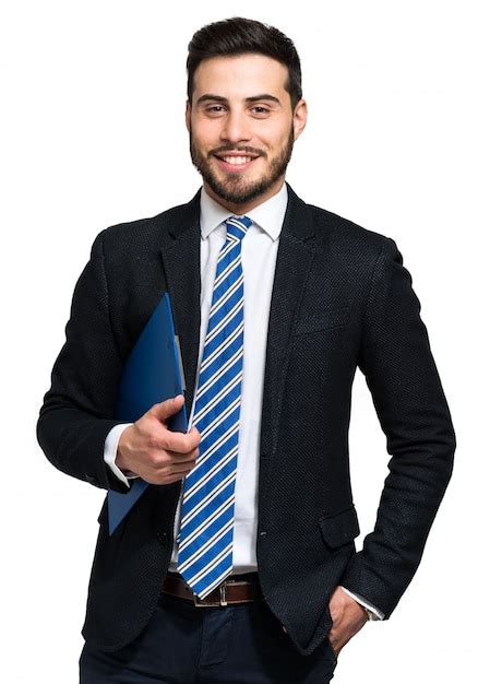 Retrato De Un Hombre De Negocios Sonriente Aislado En Blanco Foto