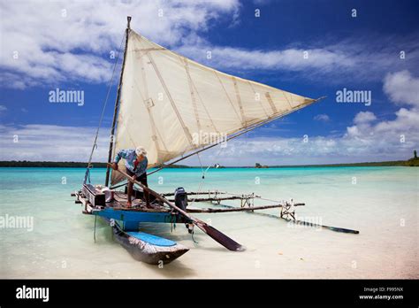 Theodore A Local Kunie Prepares A Traditional Outrigger Canoe For